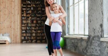 How to Encourage Teenagers to be More Active full-shot-mother-hugging-daughter_23-2148478553