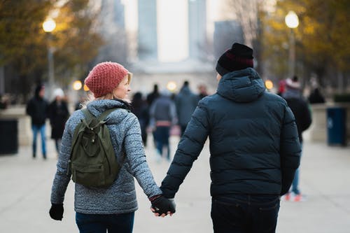 Couple holding hands